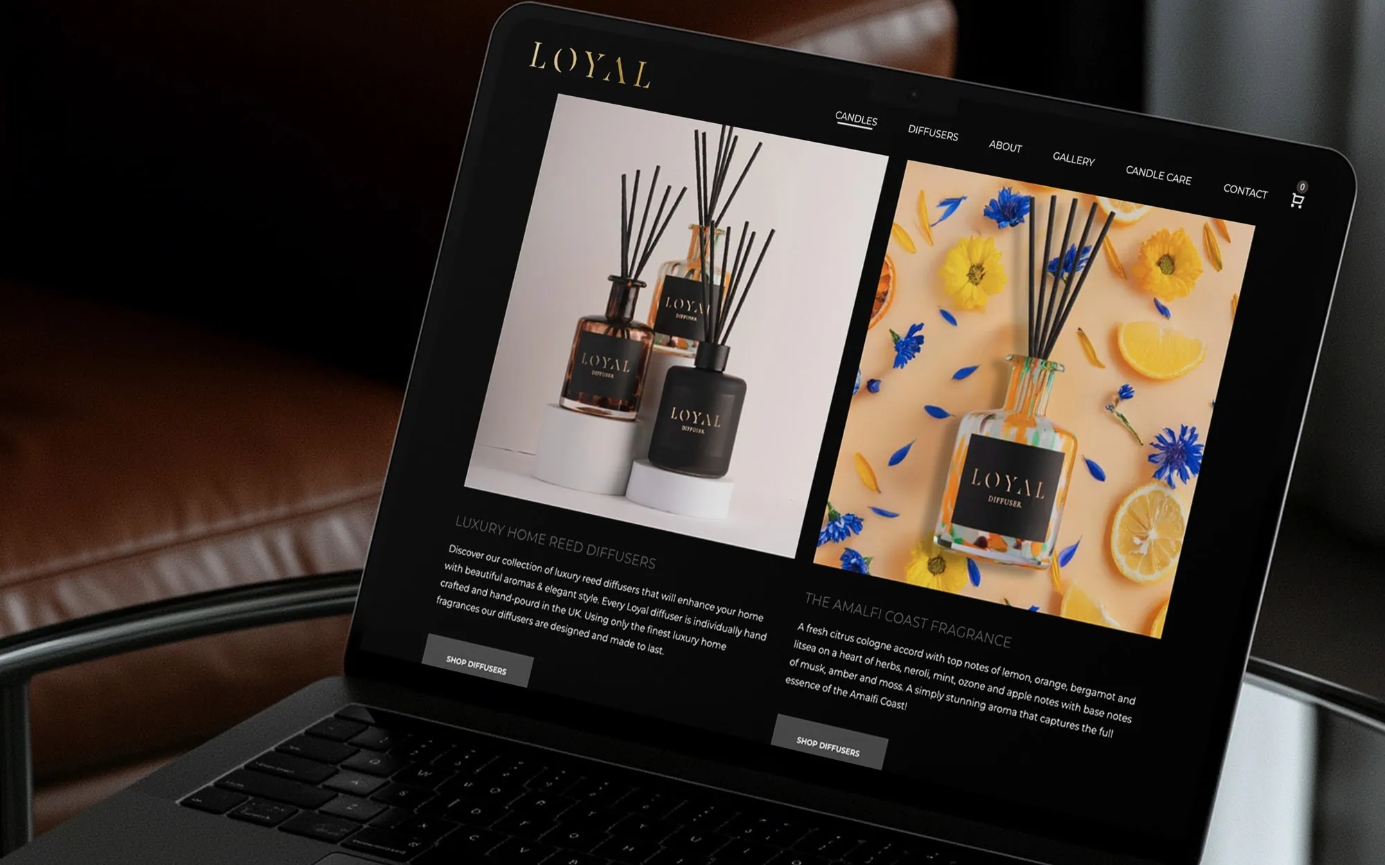 Loyal Candles website shown on a laptop